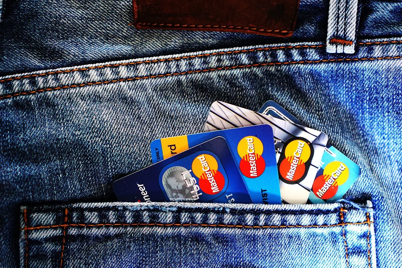 credit cards, denim, jeans, blue jeans, debit cards, cards, money, bank account, bank, mastercard, pocket, credit cards, money, money, money, money, money, bank, bank, bank. Banking fees mistakes: six habits that keep charges alive