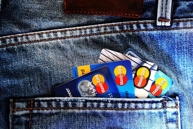credit cards, denim, jeans, blue jeans, debit cards, cards, money, bank account, bank, mastercard, pocket, credit cards, money, money, money, money, money, bank, bank, bank. Banking fees mistakes: six habits that keep charges alive